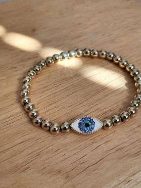 Gold Beaded Bracelet with Blue Evil Eye Accent